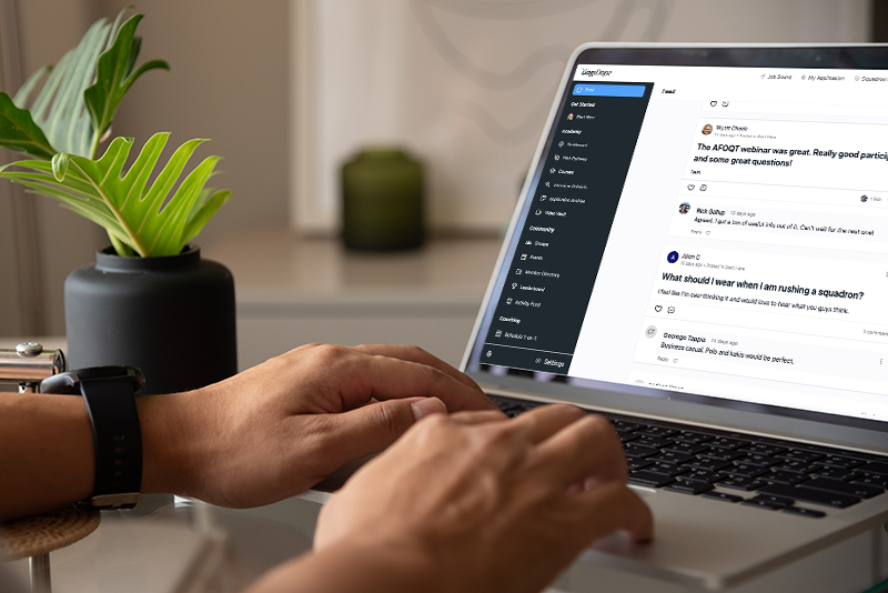 A person typing on a laptop